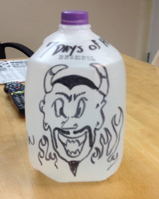 Daddy's Little Ghoul takes her 'hell jug' to work. The other EMTs and firefighters had some fun with it to support her.