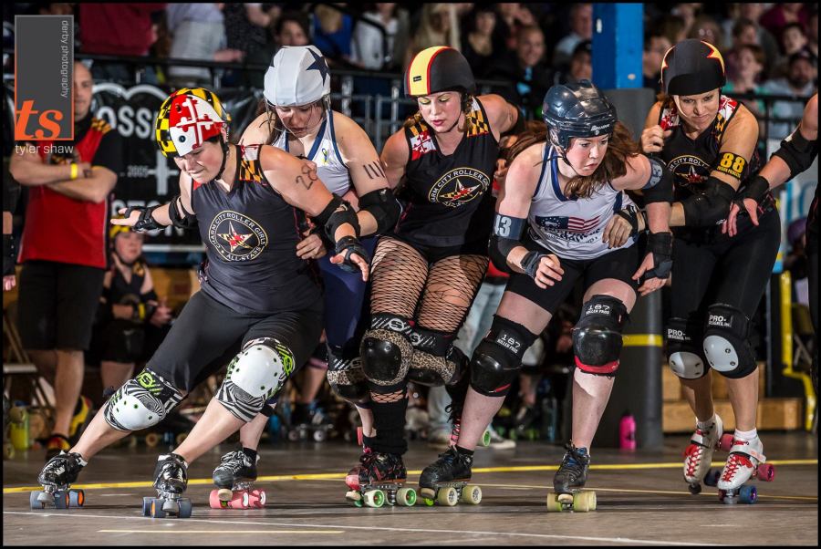 Stopping power, bursting power, agility, quick thinking and pure strength all exist in this ONE SHOT of two power house all star teams. Photo by Tyler Shaw